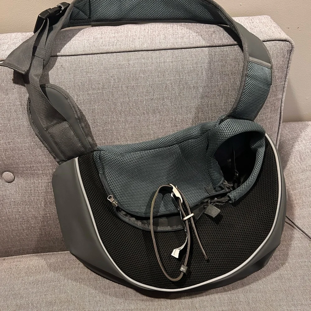 Brand new Pet Carrier. Grey/black. Holds up to 15 lbs.
